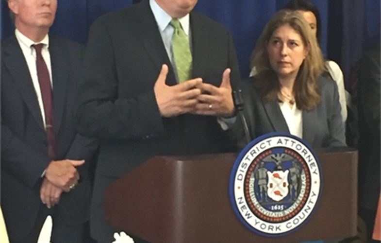 WCS EVP for Public Affairs John Calvelli speaking at press conference to announce seizure of $4.5 million in illegal ivory with Manhattan DA Cyrus Vance, Jr. (left).